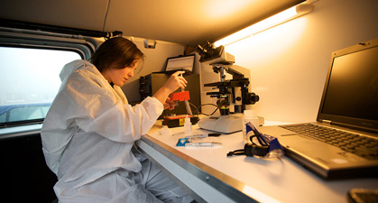 Consultant reviewing project notes with client