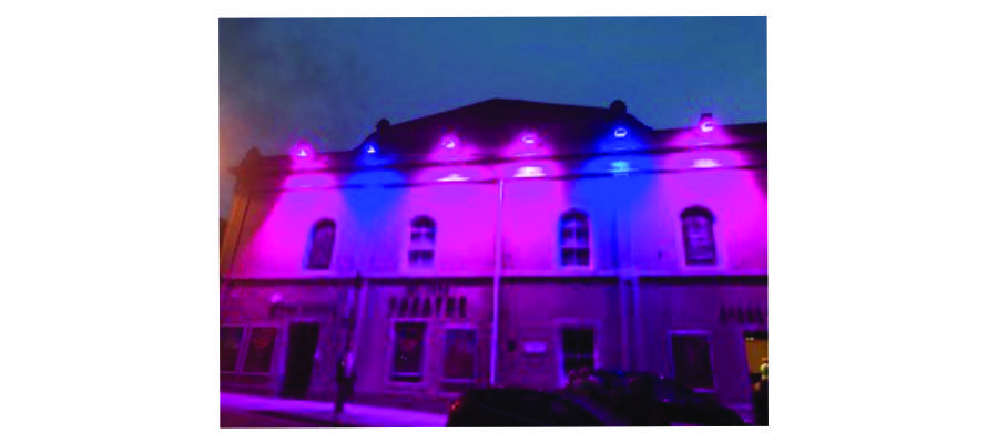 St Ives Theatre at night with purple illuminations