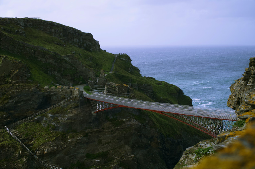 Tintagel castle foot bridge Tintagel castle foot bridge with sea background