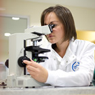 Asbestos analyst completing an asbestos test