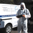 Legionella consultant with tablet and van